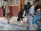 Cleaning the shrine of the commander of the faithful, Imam Ali (A.S)